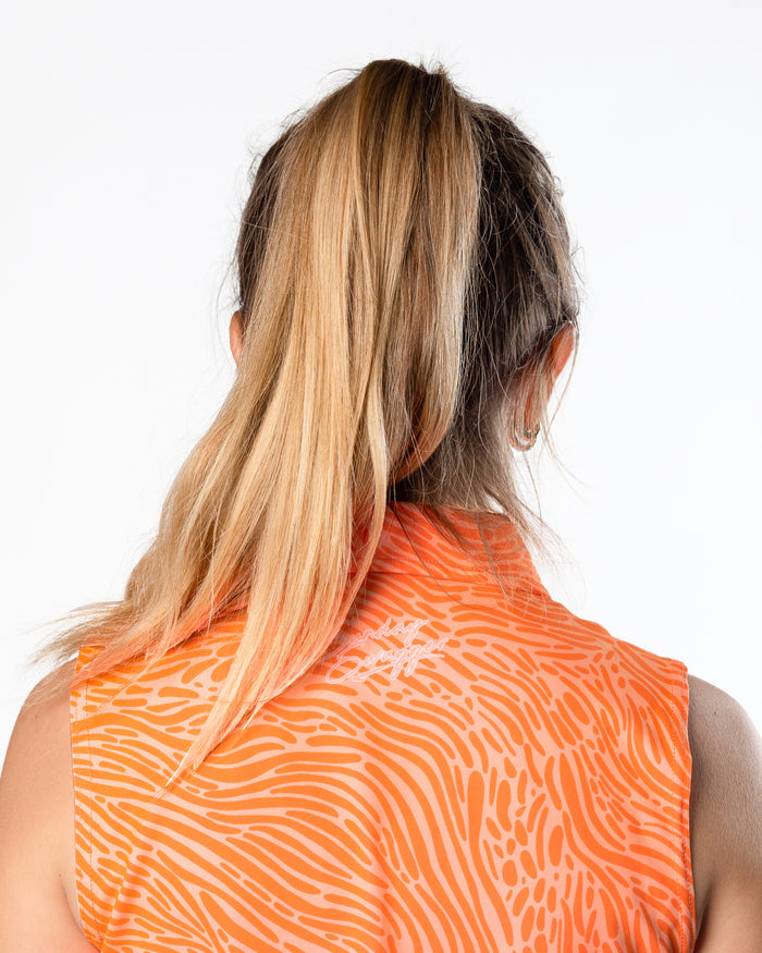Crush orange women's golf polo | Sunday Swagger