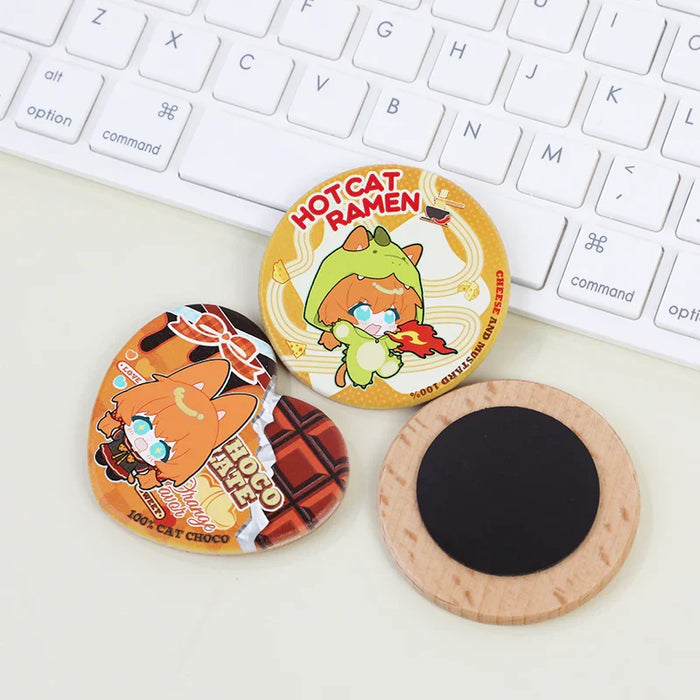 Custom 3D beechwood fridge magnets with cute anime cat designs near a keyboard