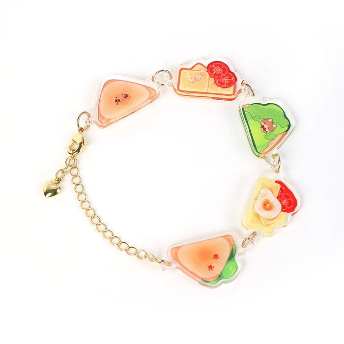Custom acrylic charm bracelet with colorful sandwich designs and gold chain on white background