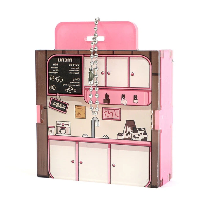Custom acrylic display case with pink kitchen design and metal keychain