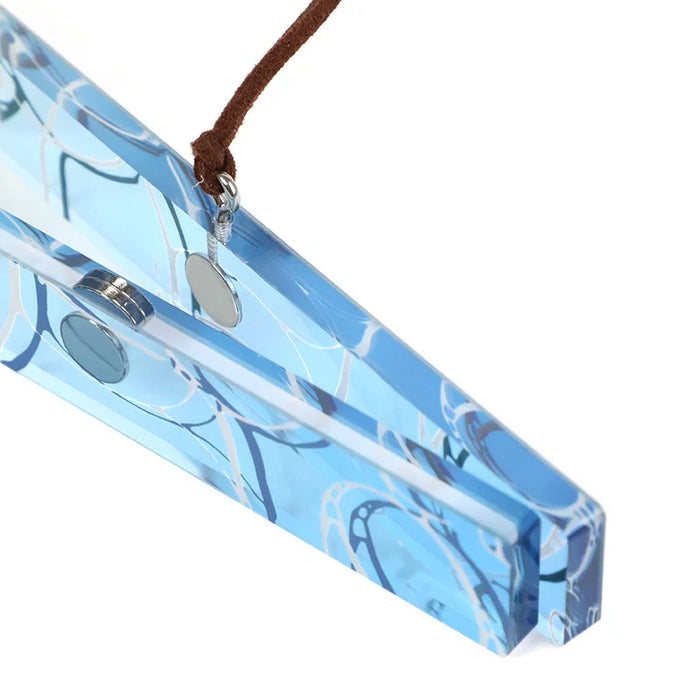 Close-up of custom acrylic magnetic poster hanger with blue design and suede hanging cord