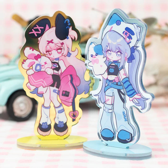 Custom acrylic anime standees featuring colorful, cute characters with pastel accessories.