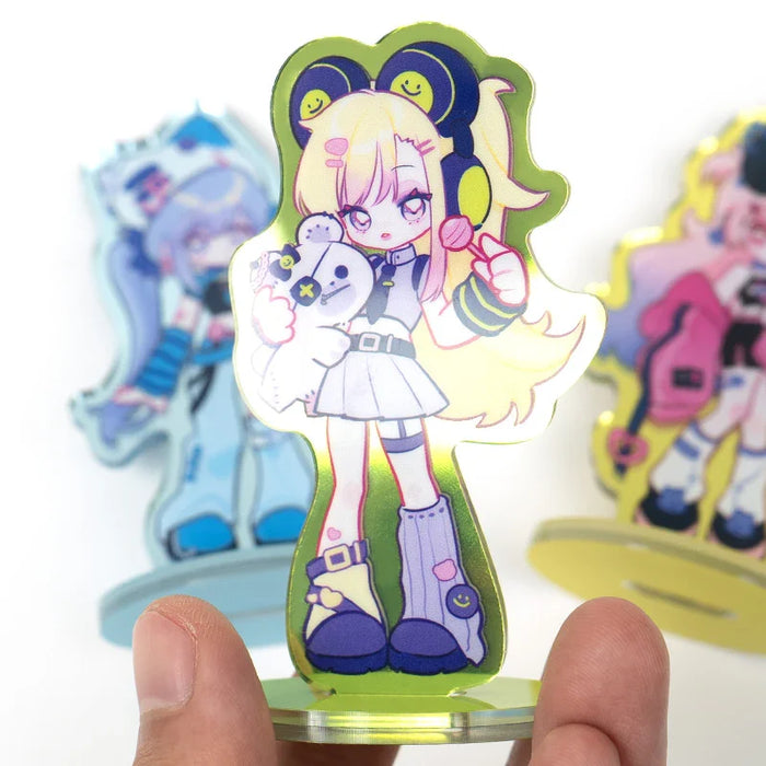 Custom acrylic standee featuring colorful anime girl with headphones, plush toy, and lollipop
