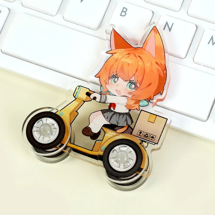 Custom acrylic scooter toy featuring anime fox girl, placed on white keyboard