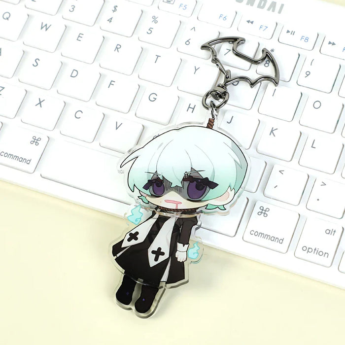 Custom acrylic anime keychain with bat-shaped clasp on white computer keyboard