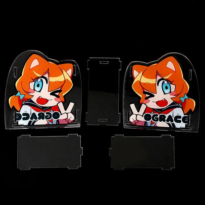 Custom acrylic pen holder parts with orange anime cat mascot, separated on black background