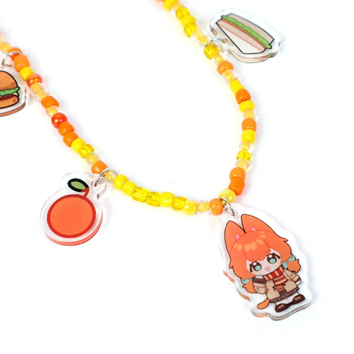 Custom beaded acrylic phone charm with orange, yellow beads and cute cartoon charms