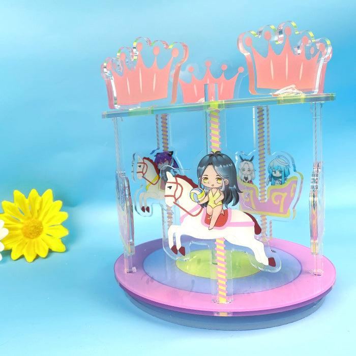 Custom acrylic carousel standee with anime characters and pink crown accents on a blue background