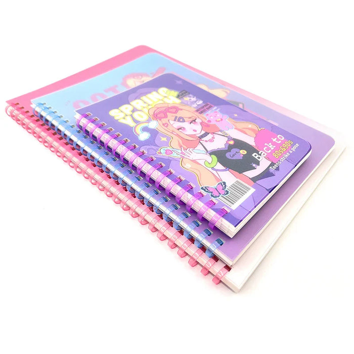 Stack of colorful custom spiral notebooks with anime-style covers and pastel coil bindings