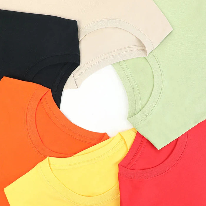Assorted colorful cotton crew neck t-shirts arranged in a flat lay pattern