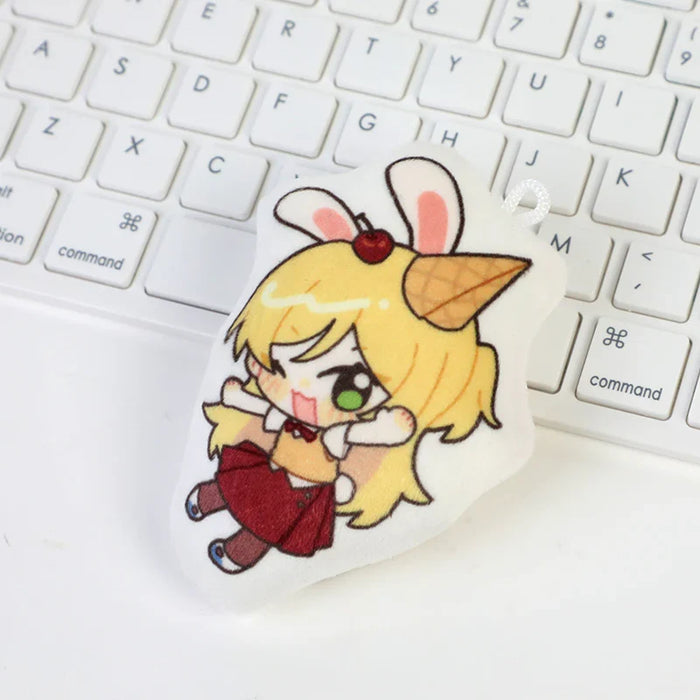 Custom anime dakimakura keychain pillow with chibi bunny girl design on white keyboard