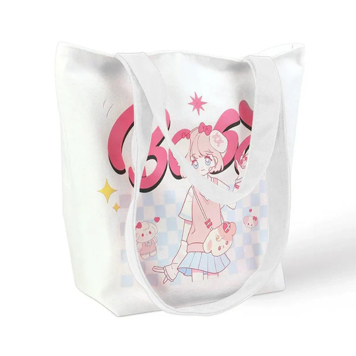 White canvas tote bag with strap, featuring pink anime girl and bear illustration, cute design