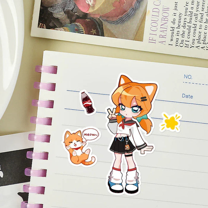 Anime cat girl and cartoon cat custom kiss cut stickers on a lined notebook page