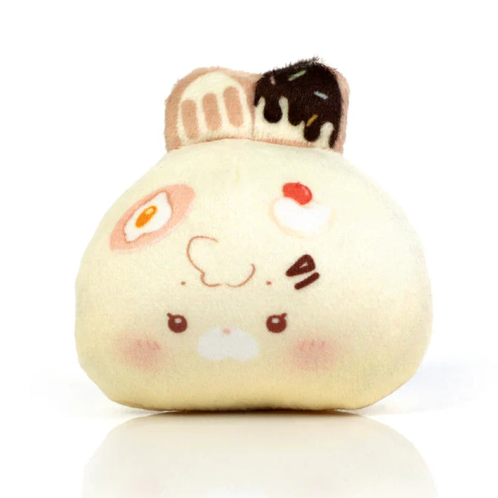 Cute plushie shaped like a breakfast bun with egg and chocolate topping, soft and kawaii design