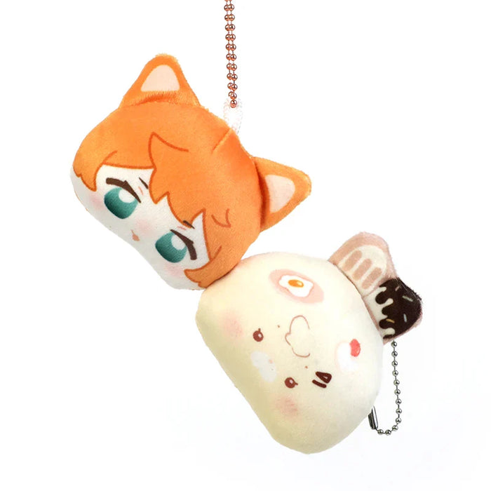 Cute anime-style plush keychain with cat ears and food-themed charm, perfect for anime merch collectors.