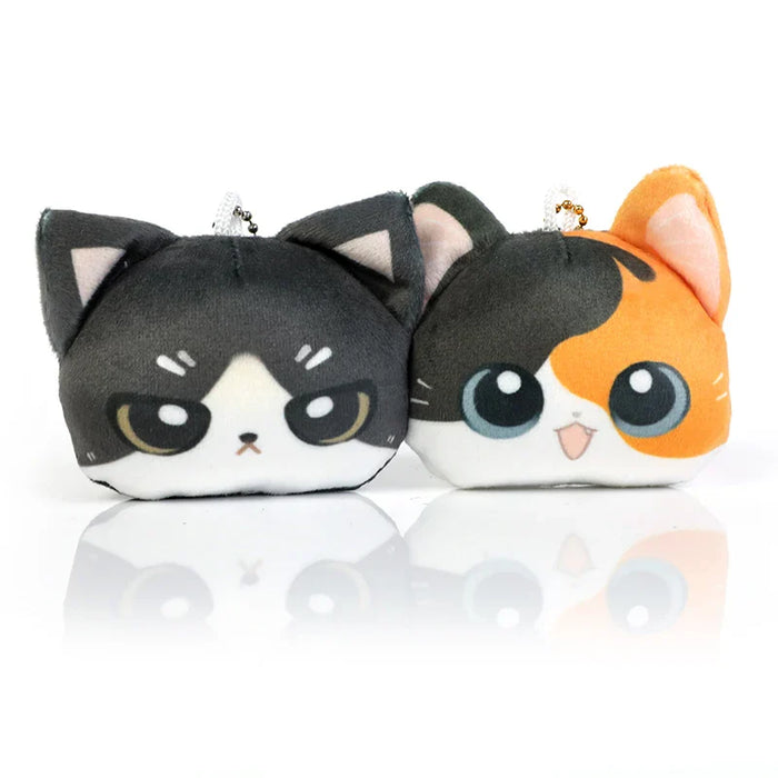 Cute cat plush keychains with expressive eyes, perfect for anime fans and collectors.