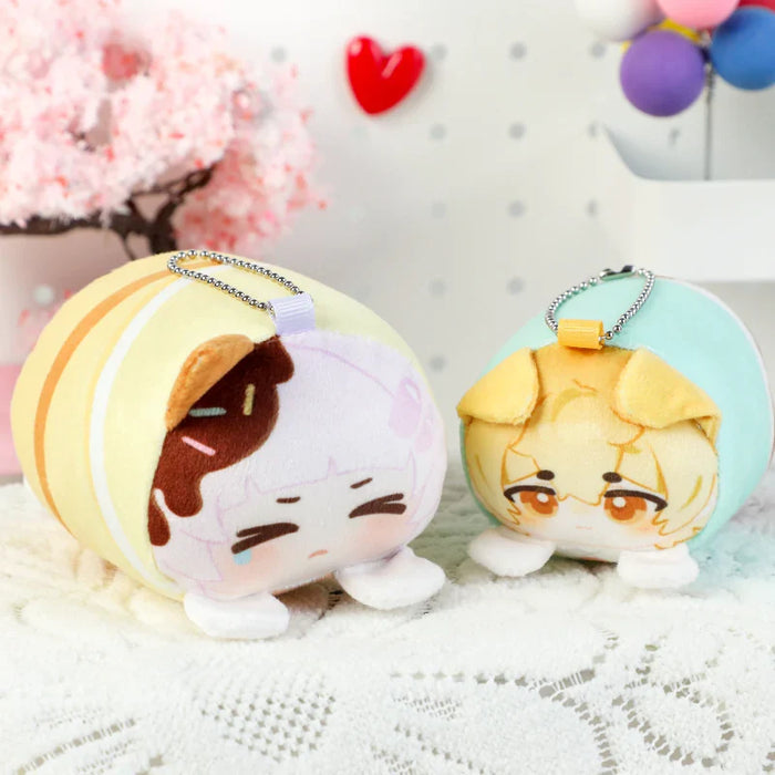 Cute anime-style plush keychains with character faces, soft fabric, and chain loops for bags or backpacks