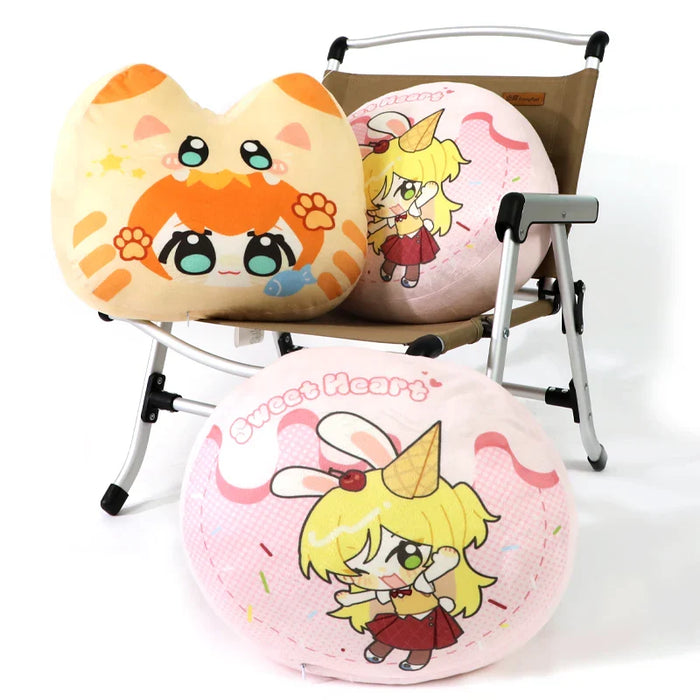 Custom anime plush pillows with cute cartoon characters on chair, round and cat-ear designs