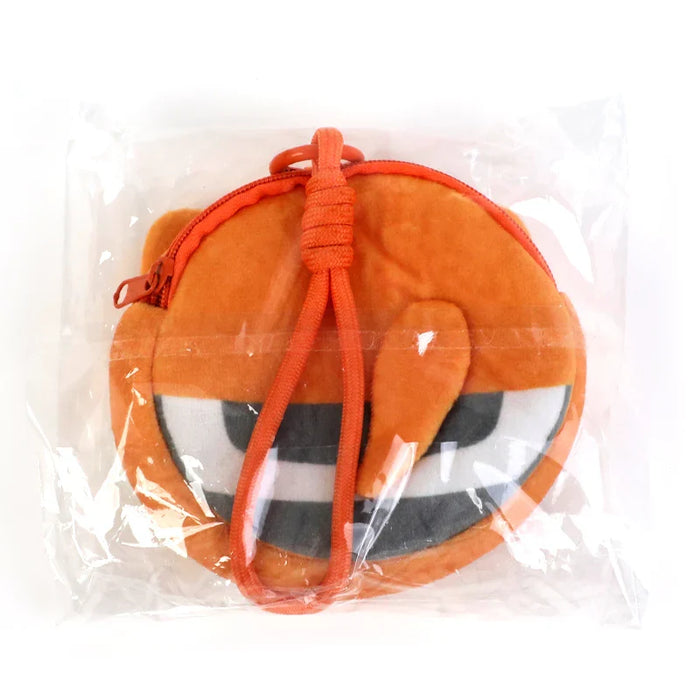 Custom orange plush coin purse with cartoon face and zipper, packaged in clear plastic bag