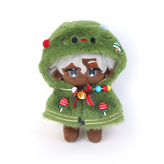 Plush doll with white hair, wearing green hooded cape decorated with beads and lollipop accents