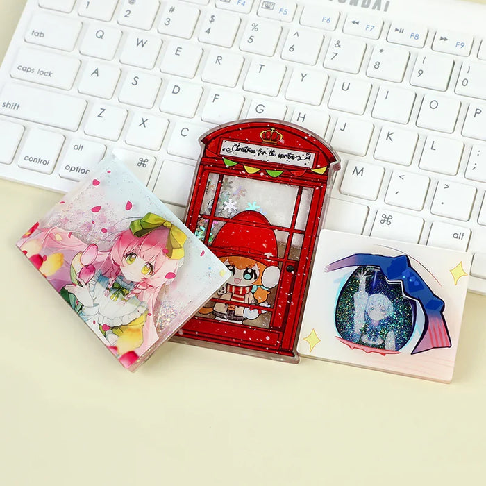 Custom pre-filled quicksand liquid anime fridge magnets on a white keyboard