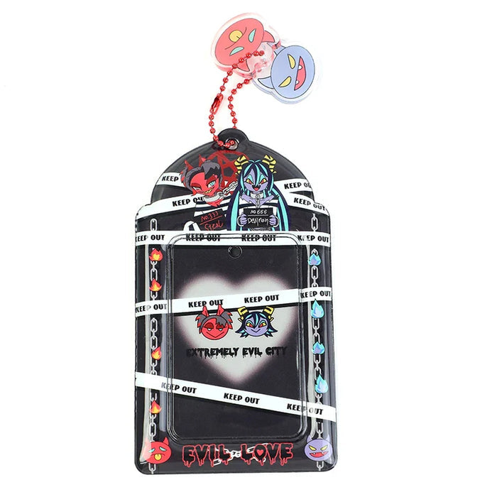 Custom PVC photocard holder with anime-style devil characters, chains, and 'keep out' tape design.