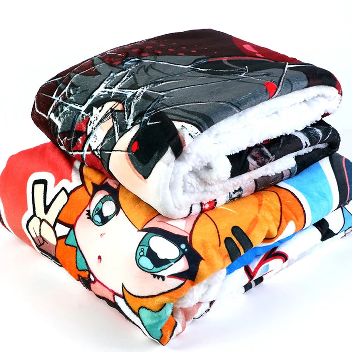 Stack of custom coral fleece blankets with colorful anime character designs