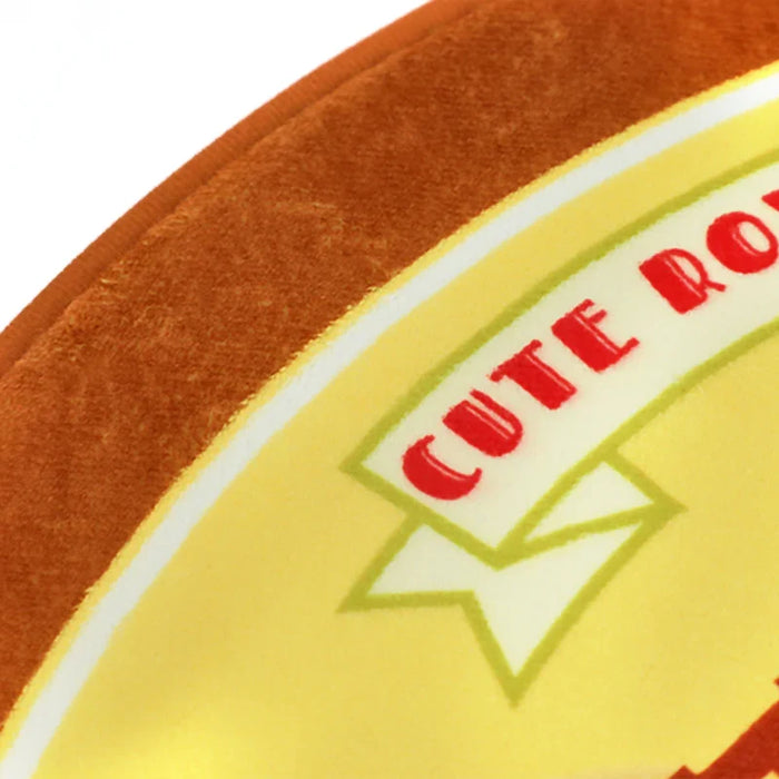 Close-up of a custom coral fleece floor mat with yellow and orange design and red text.
