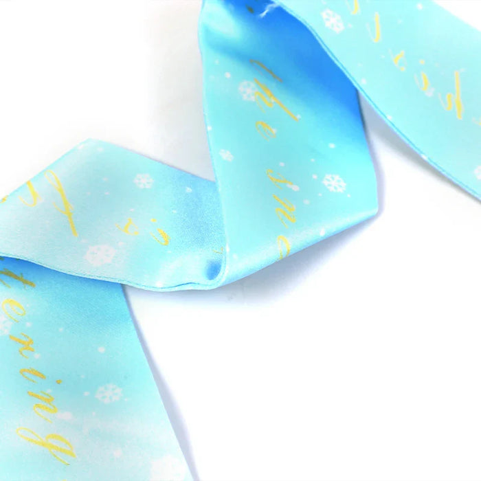 Custom light blue silk scarf with snowflake pattern and yellow script text