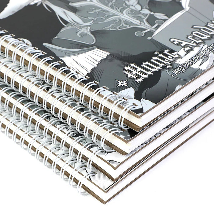 Stack of custom printed spiral sketchbooks with anime art cover