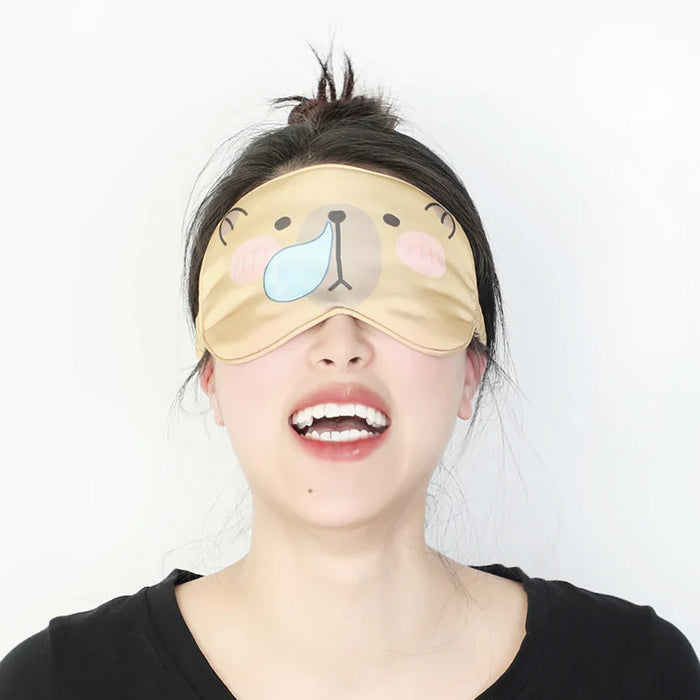 Woman wearing cute animal face silk-like custom sleep mask, smiling, white background
