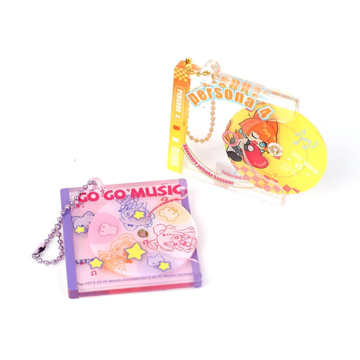 Custom acrylic slide-out CD keychains with colorful anime and music-themed designs