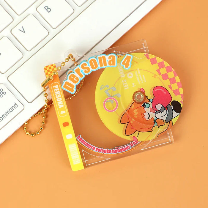 Custom acrylic spinning CD keychain with Persona 4 anime design, keyboard background