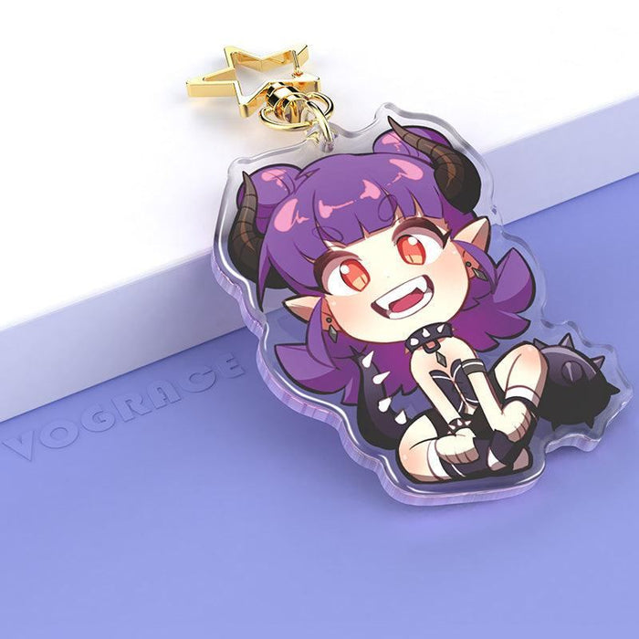 Custom acrylic keychain featuring a chibi demon girl with purple hair and horns on a pastel background