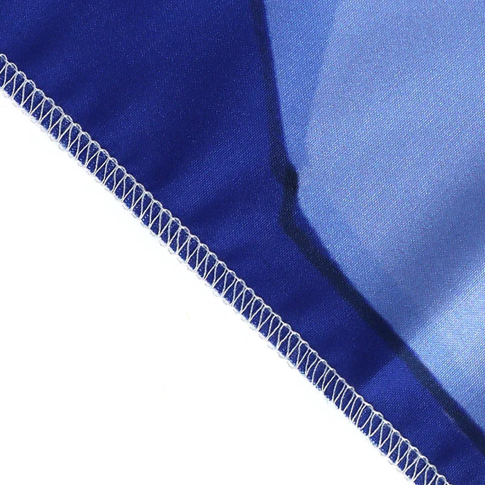 Closeup of custom tapestry edge with blue fabric and visible stitched hem