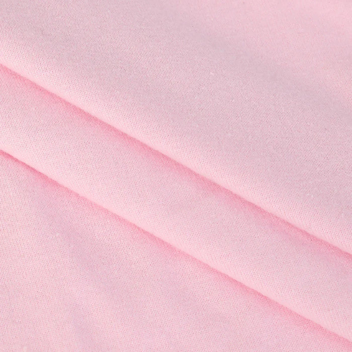 Soft pink cotton crew neck t-shirt fabric, close-up texture detail for custom printing