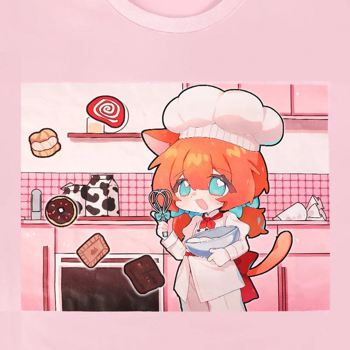 Pink cotton T-shirt featuring cute anime cat girl chef with baking utensils in a kitchen scene