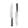 Zwei schwarze Messer, eines schräg nach oben und das andere nach unten zeigend.