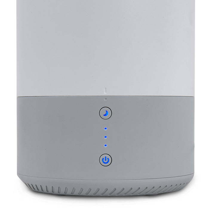 Close-up of Levoit Dual 100 Ultrasonic Humidifier & Diffuser controls, showing power and mist level buttons with blue LED indicators.