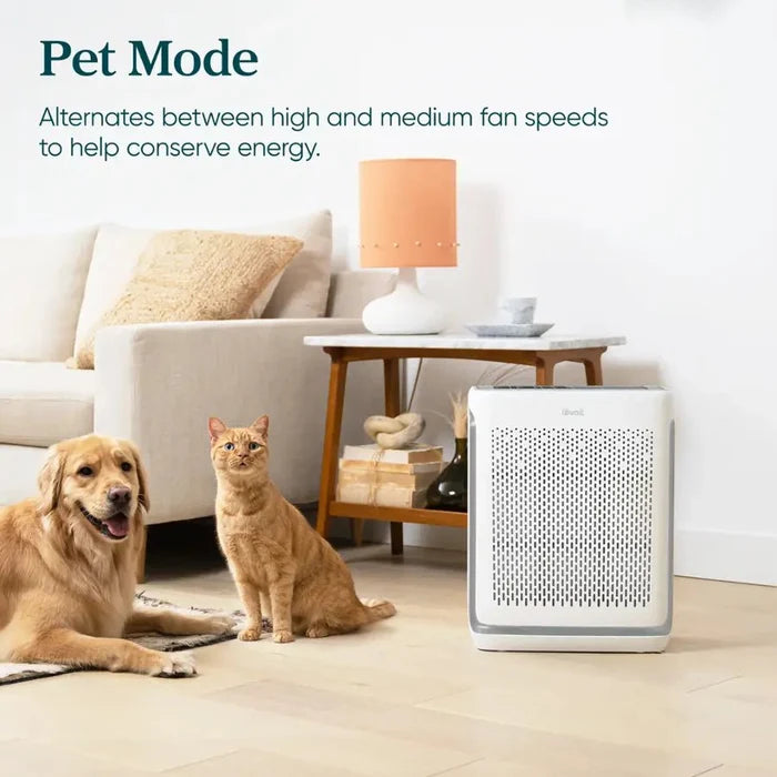 Levoit Vital 200S-P Smart Air Purifier running Pet Mode next to a dog and cat.