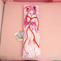 Custom anime body pillow with pink-haired character on a pink bed, books beside it