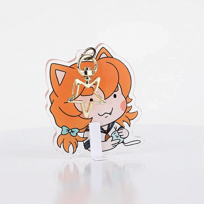 Custom acrylic keychain with cute orange-haired cartoon character and star-shaped clasp