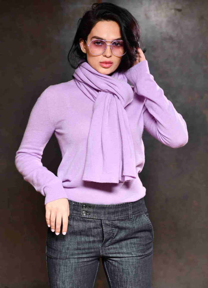 Violet sunglasses worn with violet cashmere sweater and soft scarf