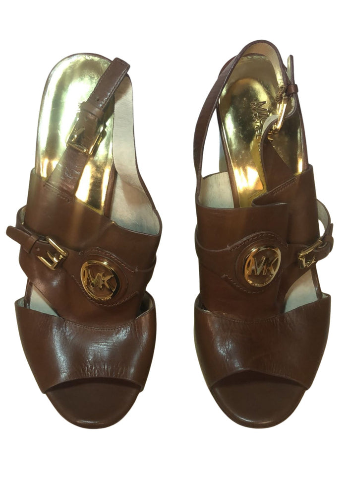 Michael Kors gold wedge espadrille sandals size 11, featuring snakeskin strap and metallic platform